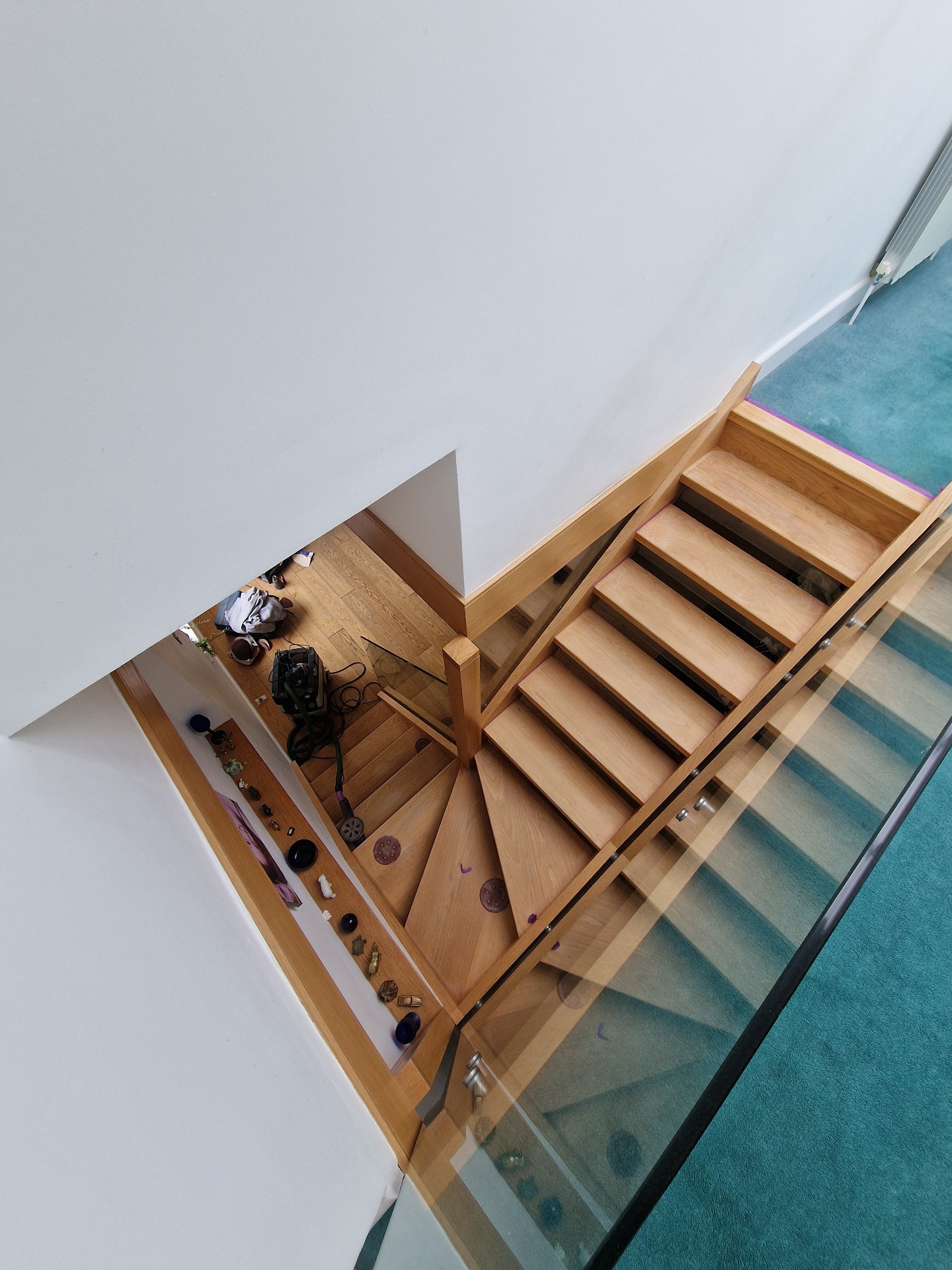 Bespoke oak staircase with glass balustrade