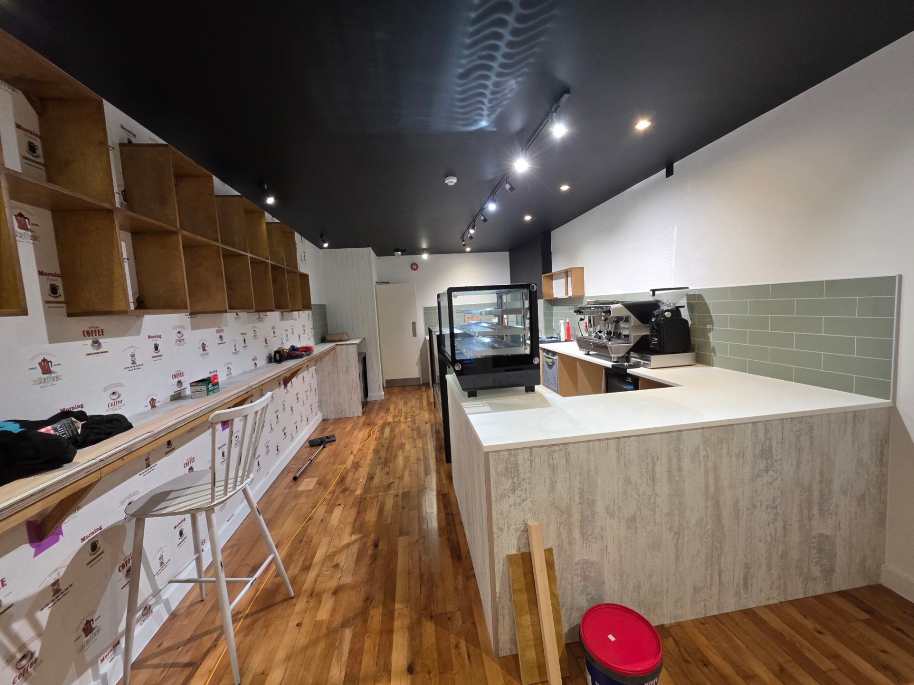 Espresso machine and cake display installed on the finished service counter