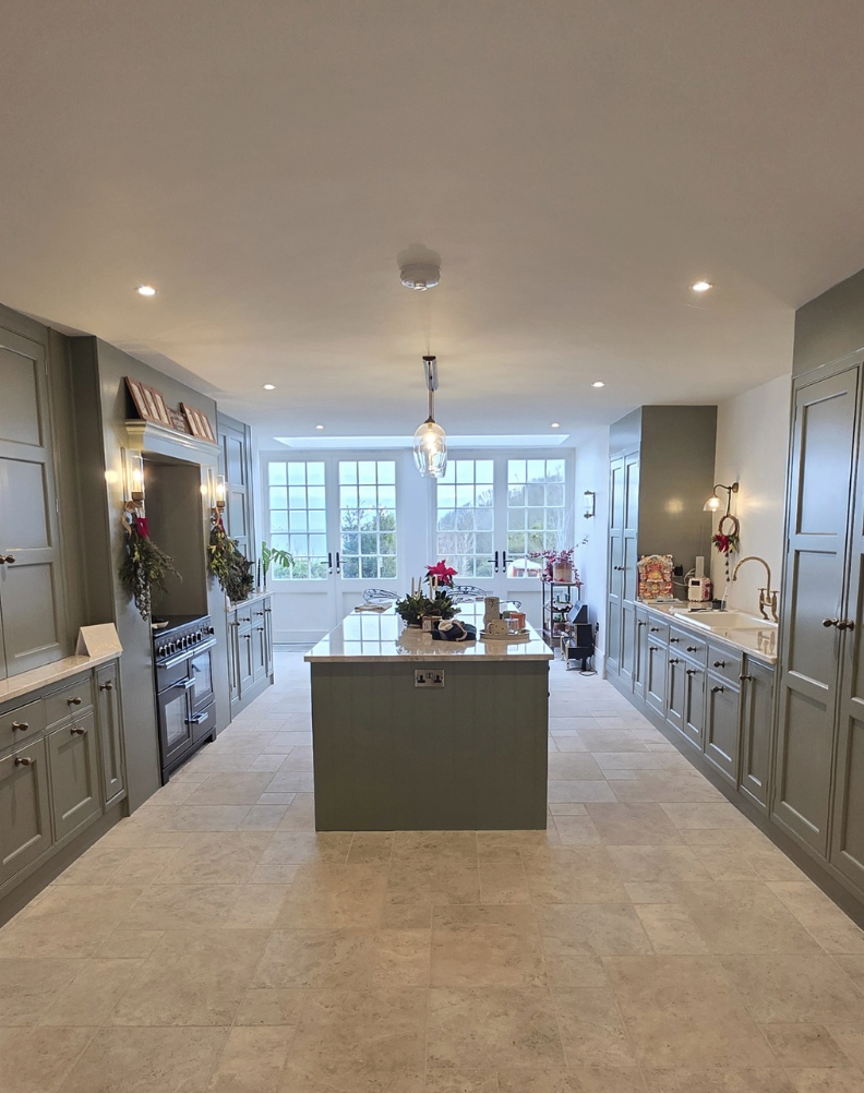 Completed bespoke kitchen — wide interior shot, natural light