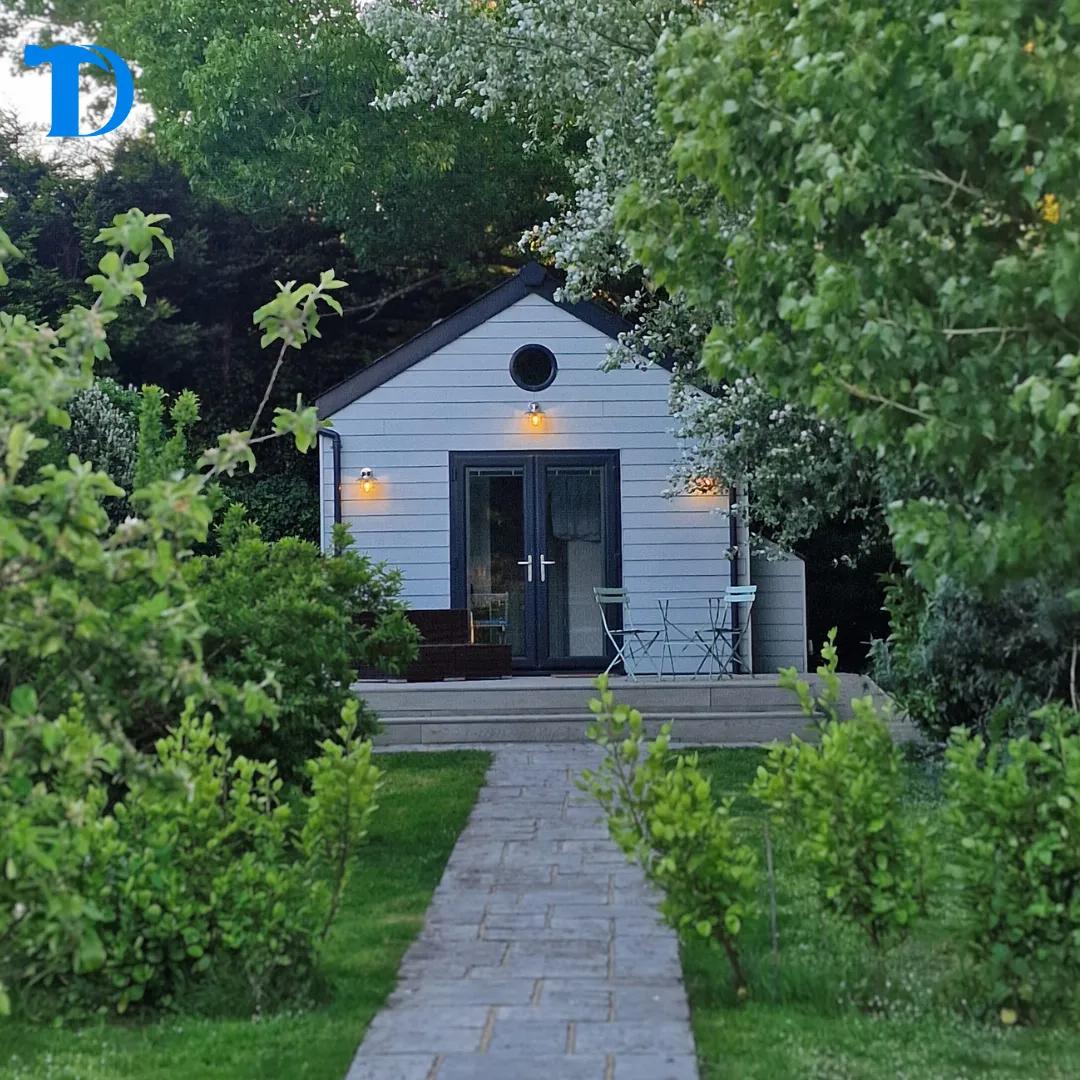 The Hideaway garden studio at dusk