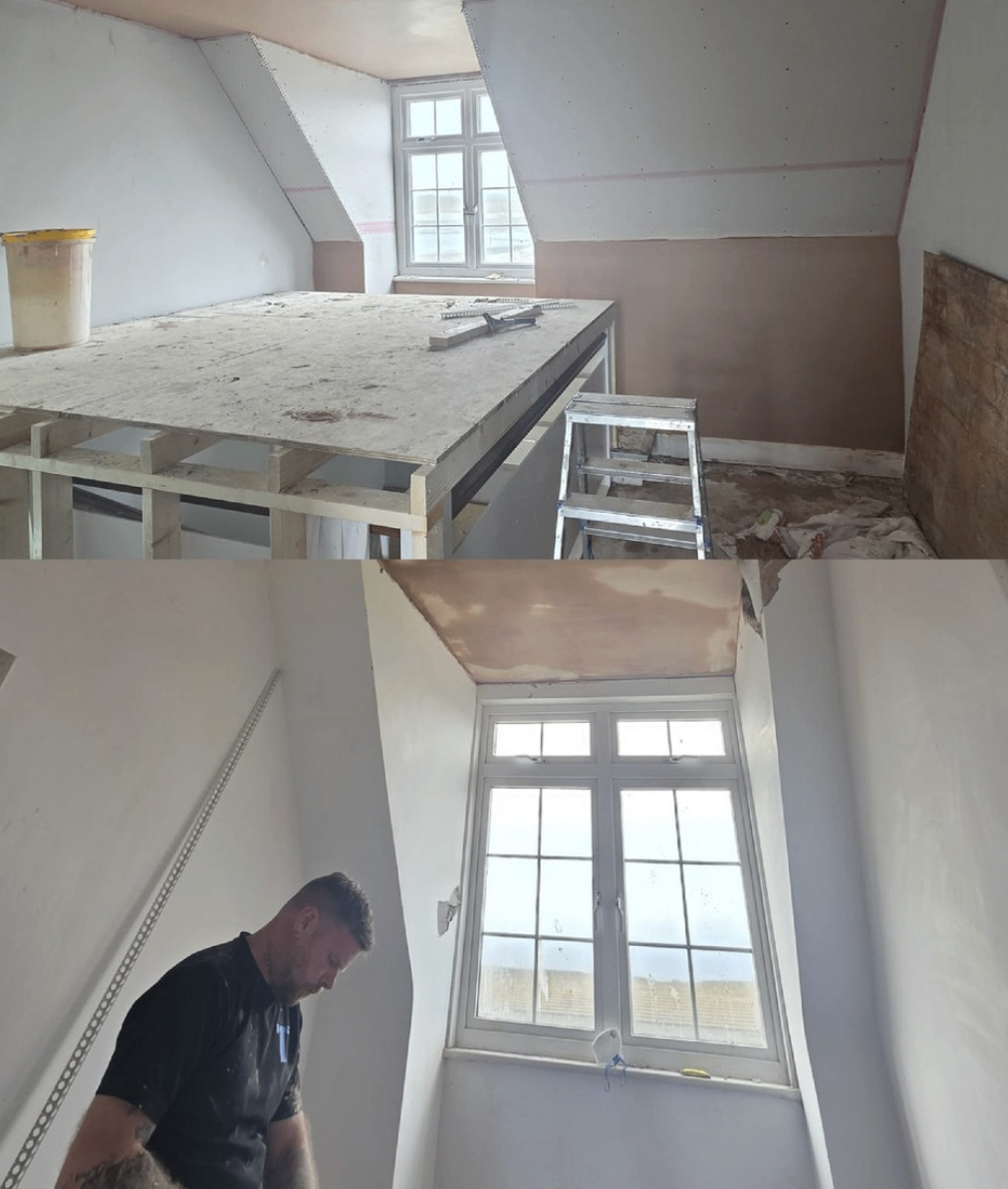 Loft-level construction and room shaping in progress