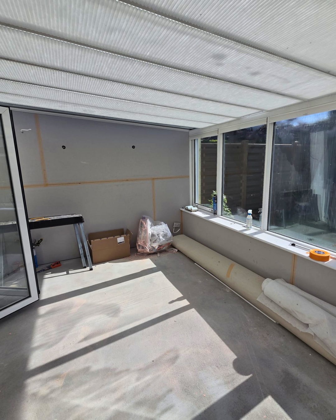 Foil-backed insulated plasterboard installed to conservatory walls