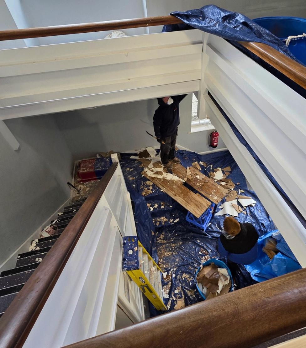 Team clearing debris below the internal gallery